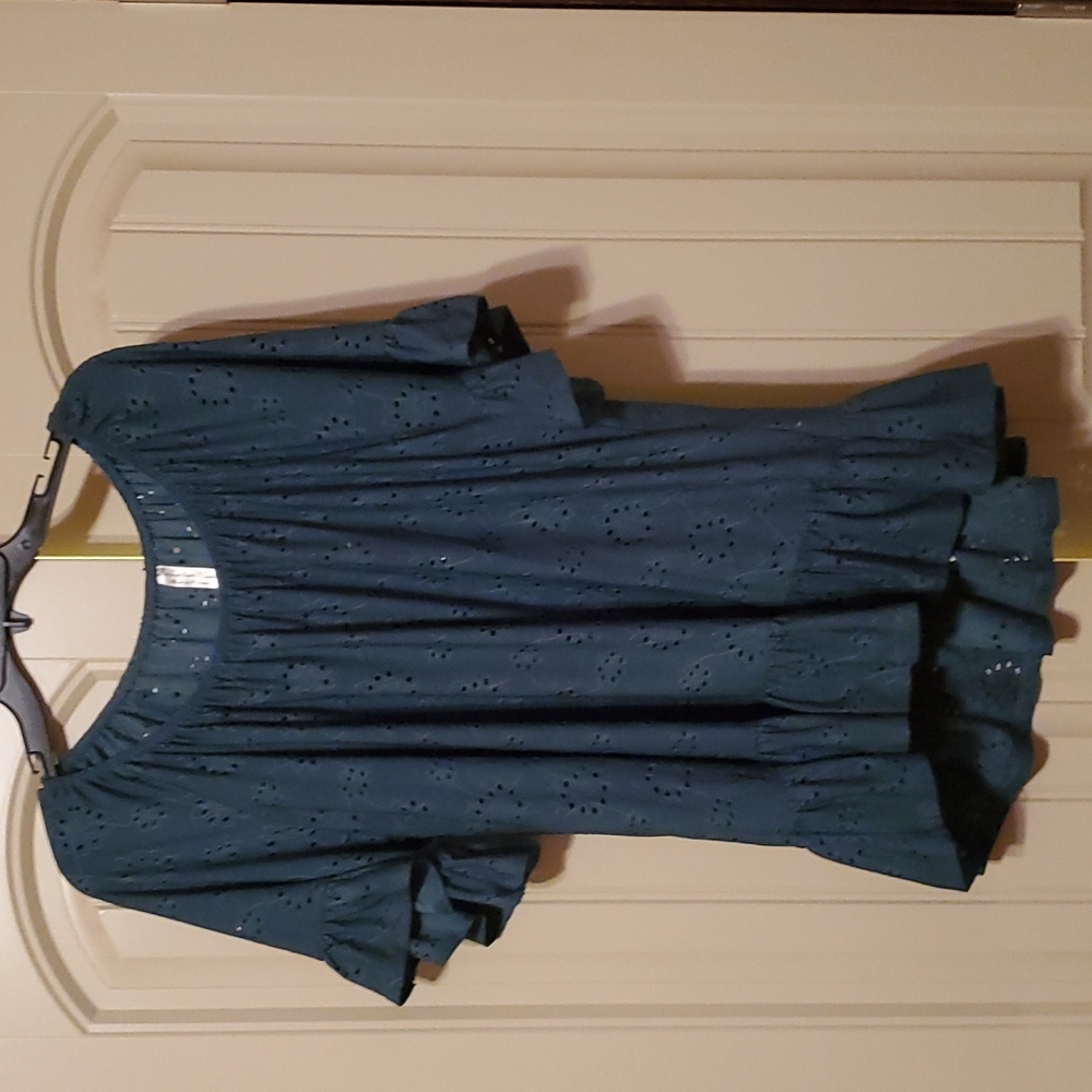 Green flowy ruffle bottom with a hi lo hem.